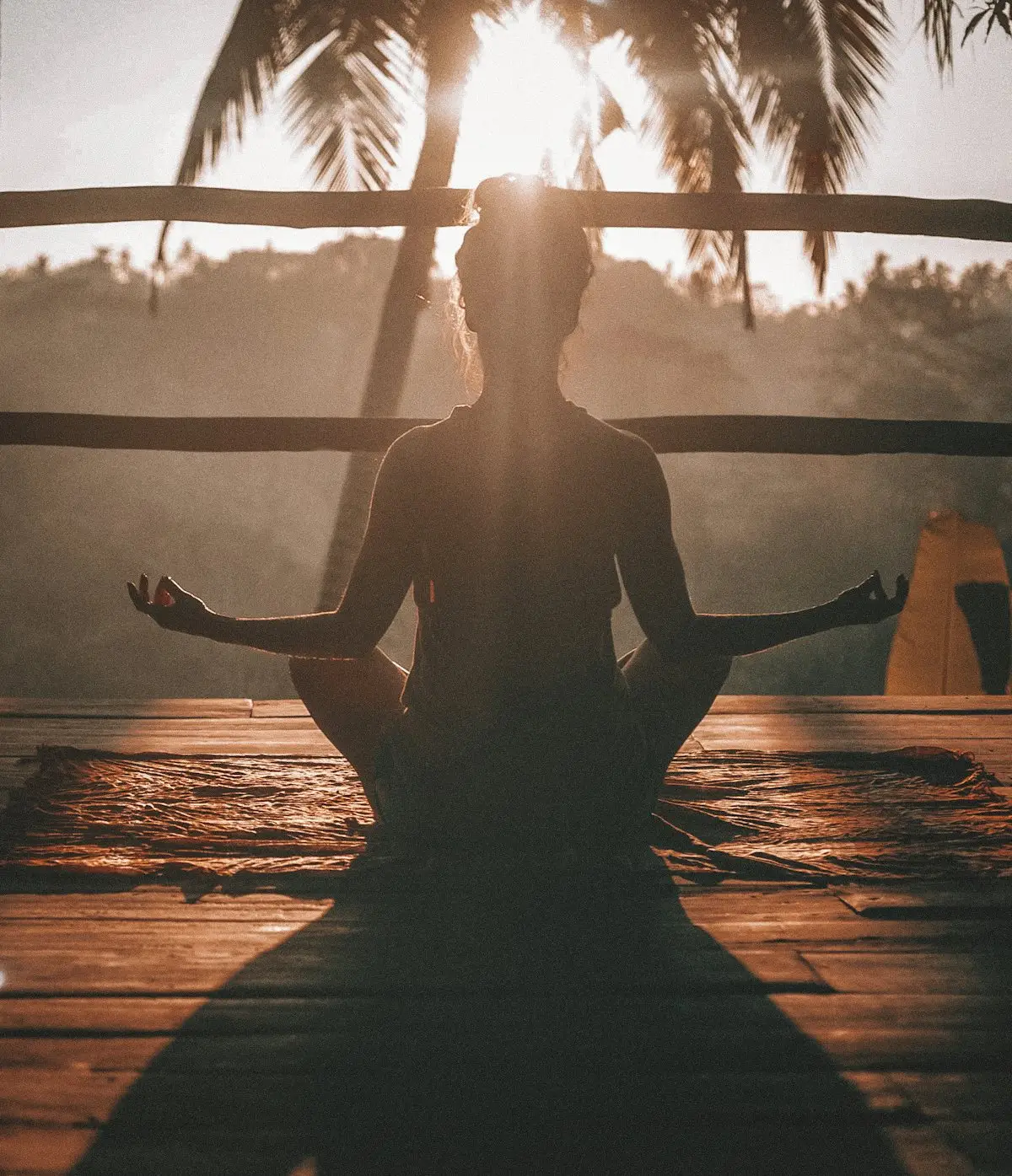 Person practicing deep breathing in a calm environment